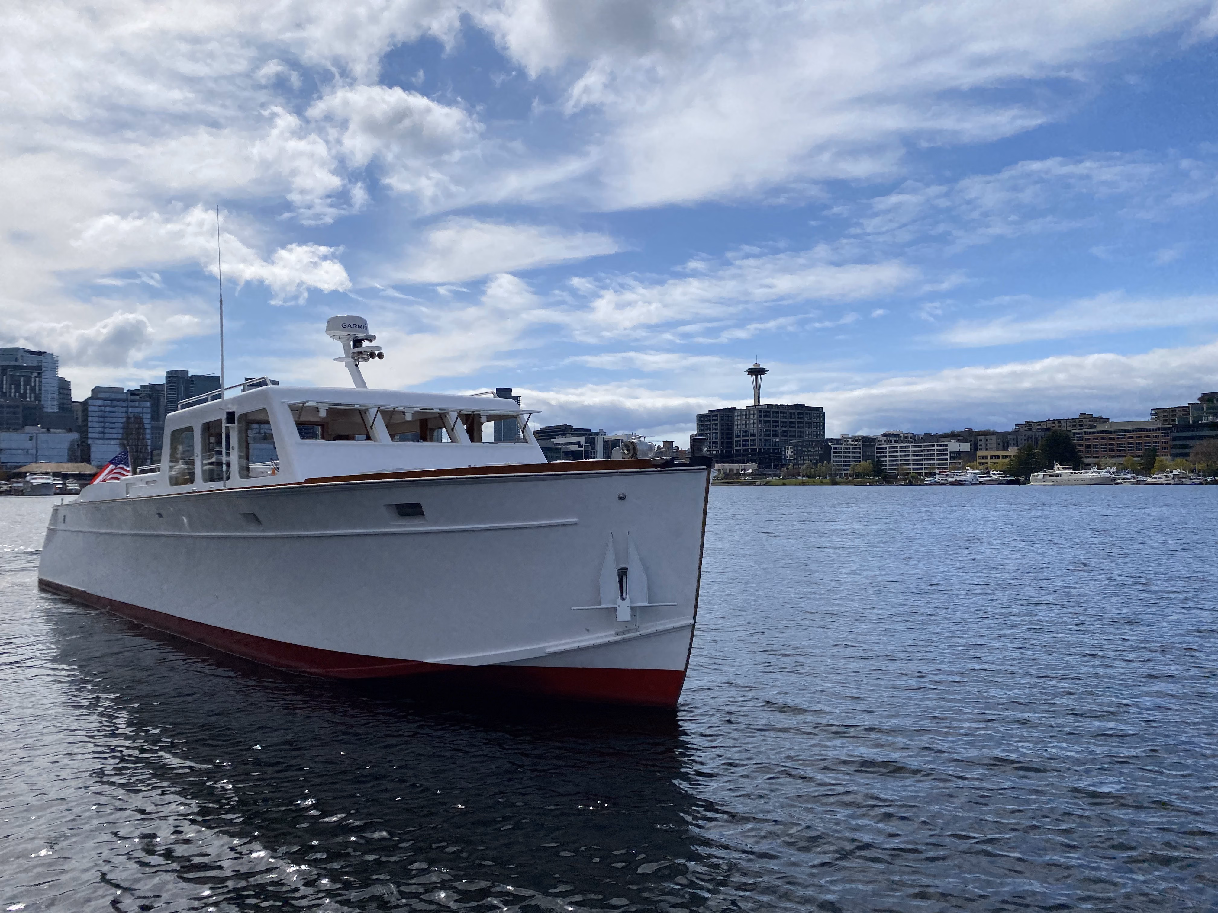 Huckins Fairform Flyer at sunset Seattle charter