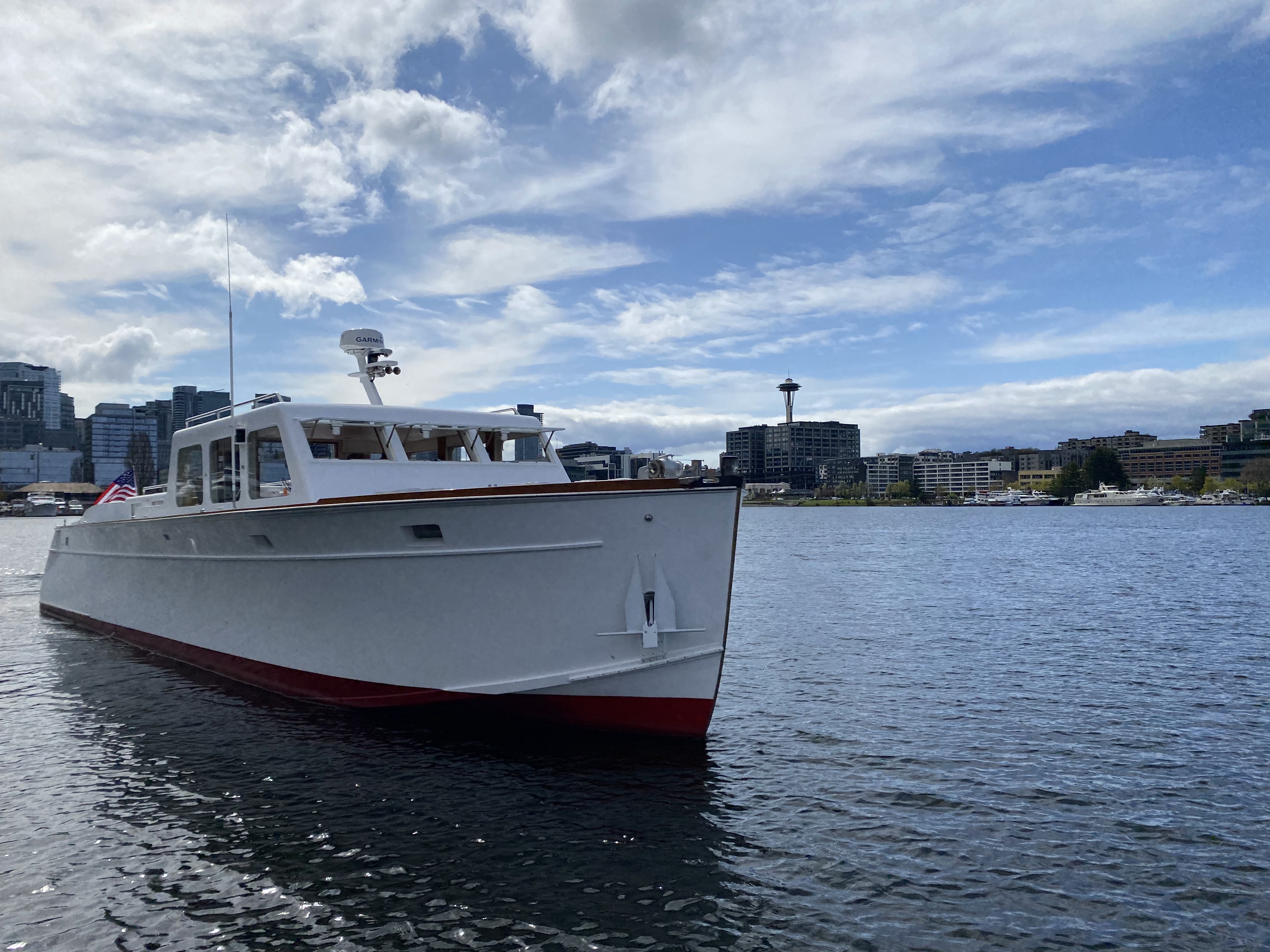 Huckins Fairform Flyer at sunset Seattle charter