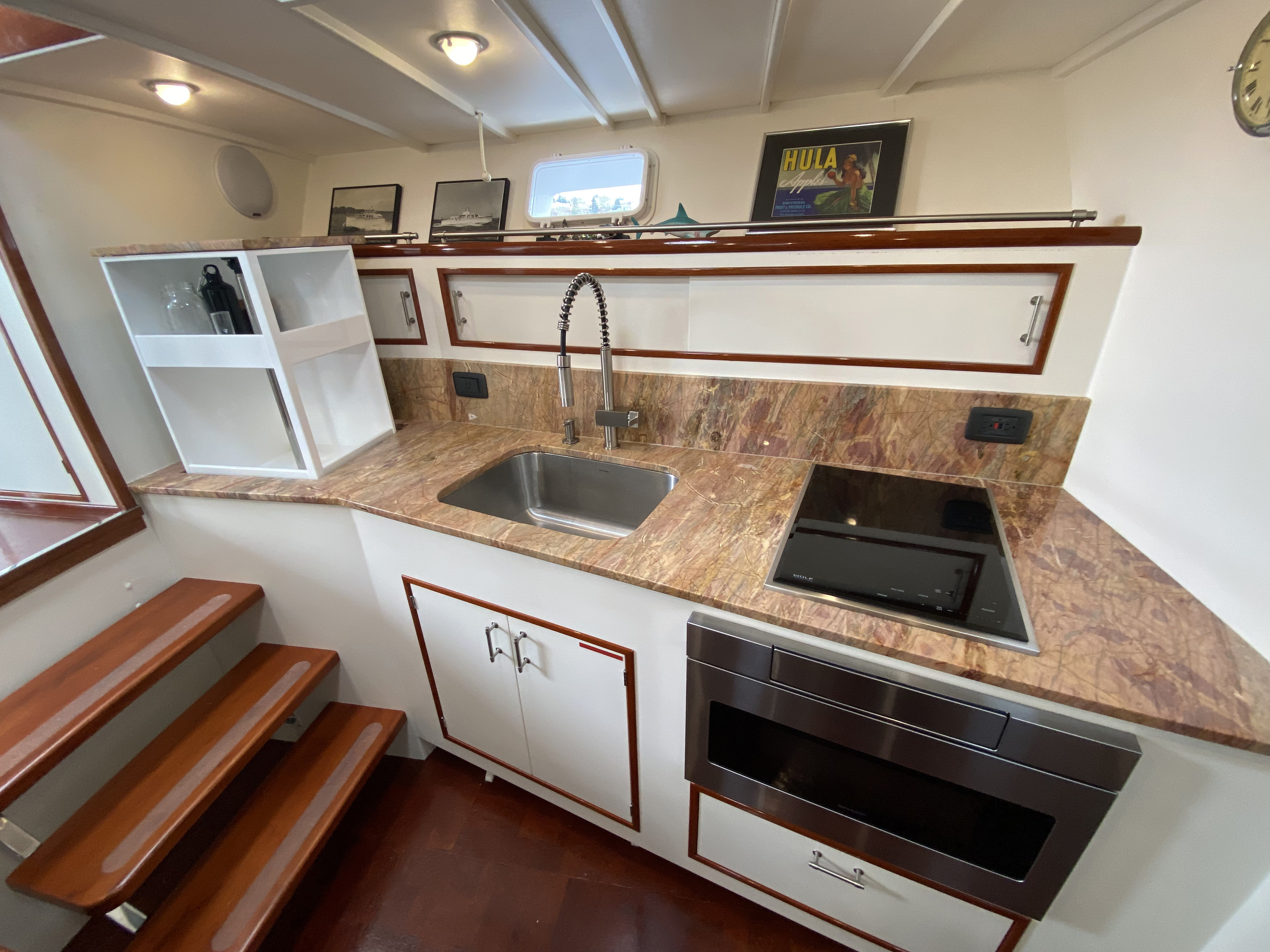Historic Huckins yacht bow and hull detail at dock