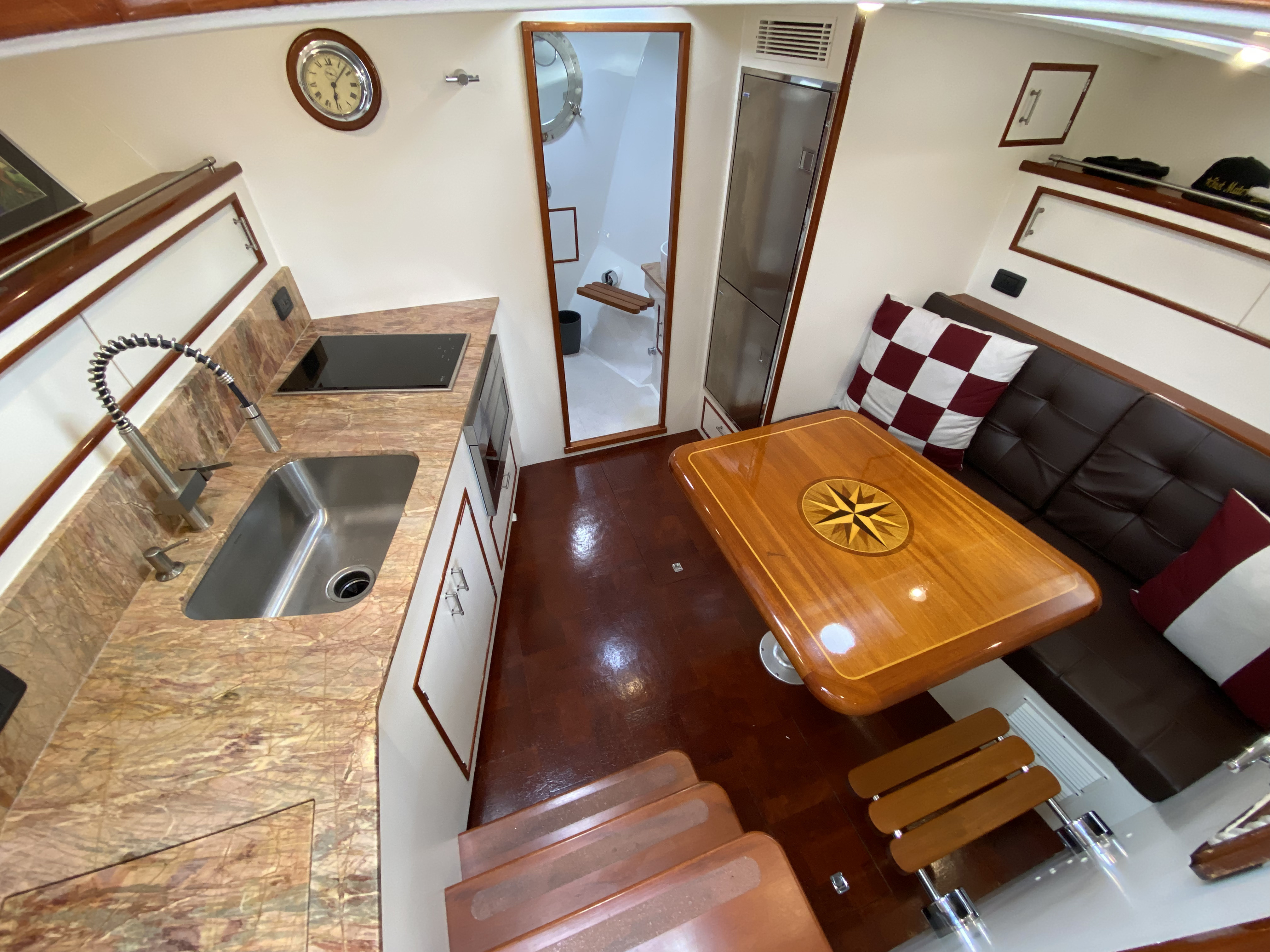 Deck and seating area of 1947 Huckins charter yacht