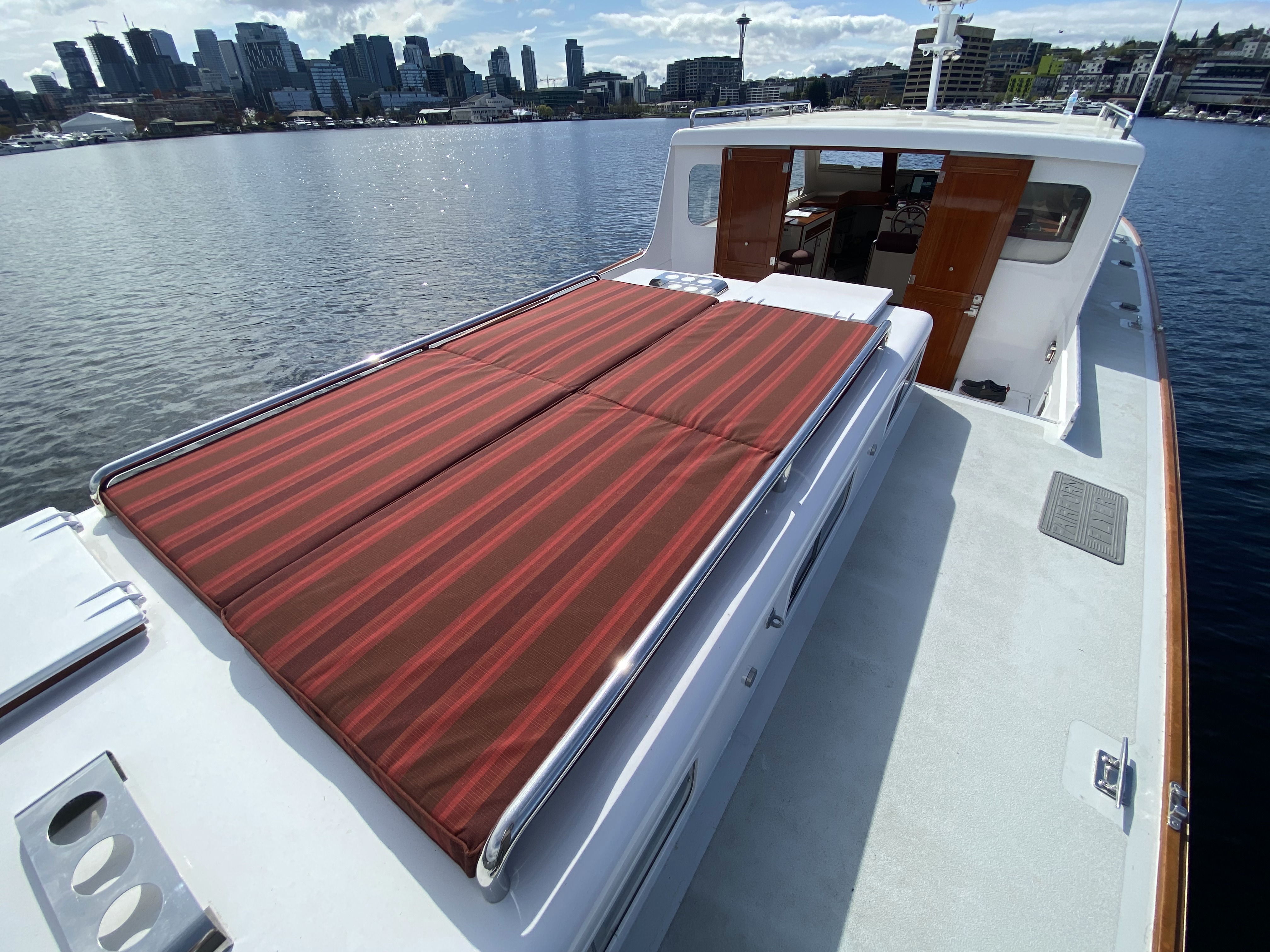 Sundeck lounge area on Huckins wooden yacht Seattle